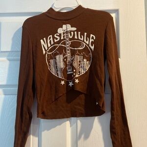 Brown and white small long sleeve shirt